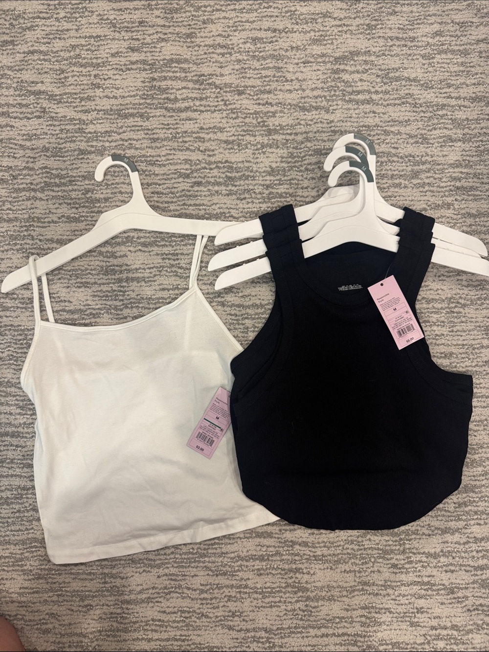 4 wild fable Tops! 
3 Black Ribbed Racer Back Cropped Tank Top & 1 White tank